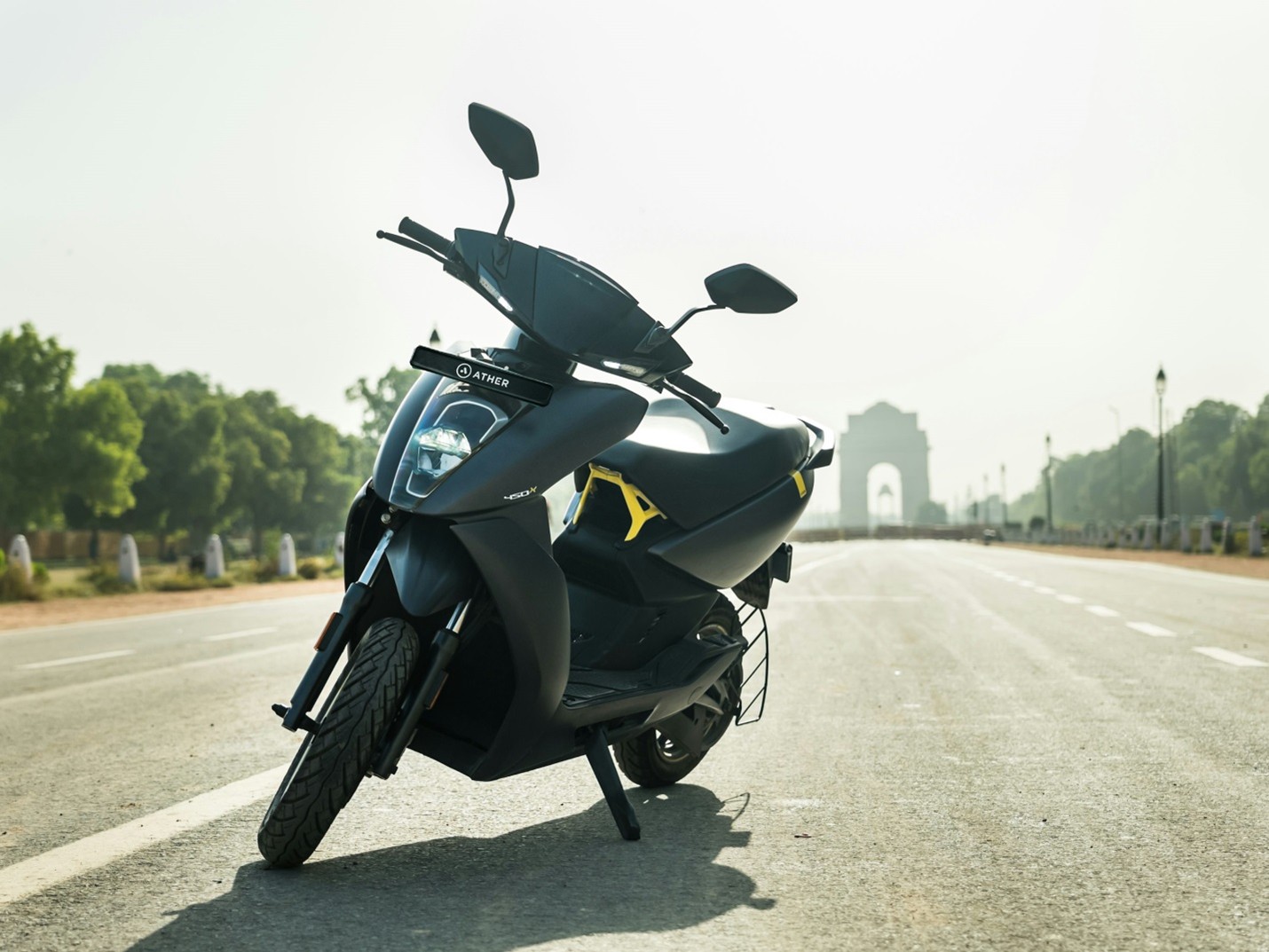 Modern electric scooter on an urban road symbolizing India’s transition to sustainable mobility.
